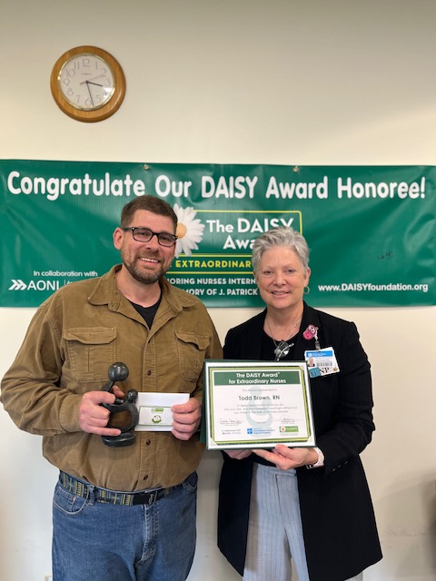 DAISY Award honoree Todd Brown with Chief Nursing Officer Aimee Carew-Lyons